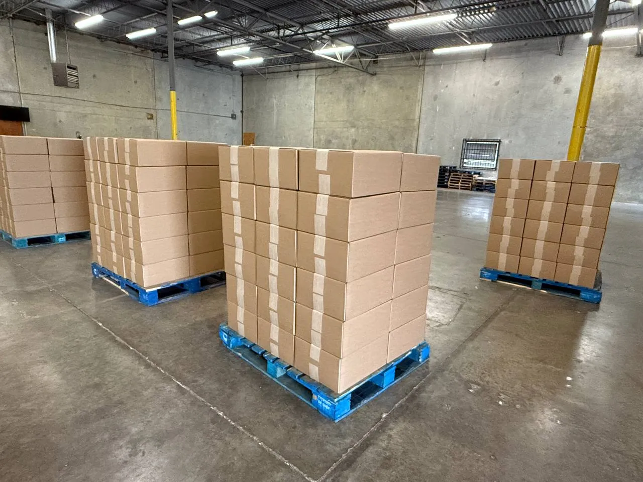 Packed and labeled customer orders staged to ship from the Honeybee warehouse